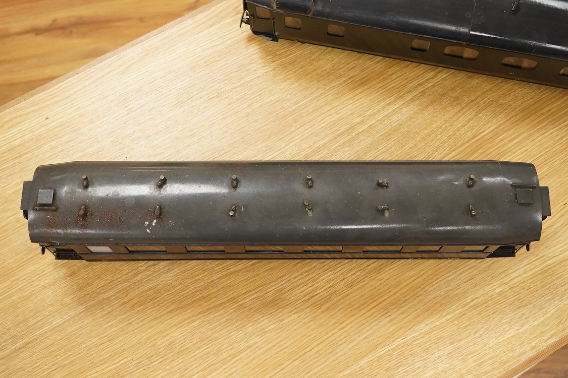 Four Gauge One Continental bogie coaches; two in very dark Green livery, and two ‘Trains Rapides Nord’ in dark green, including some scratch building and possible adaptation from kits